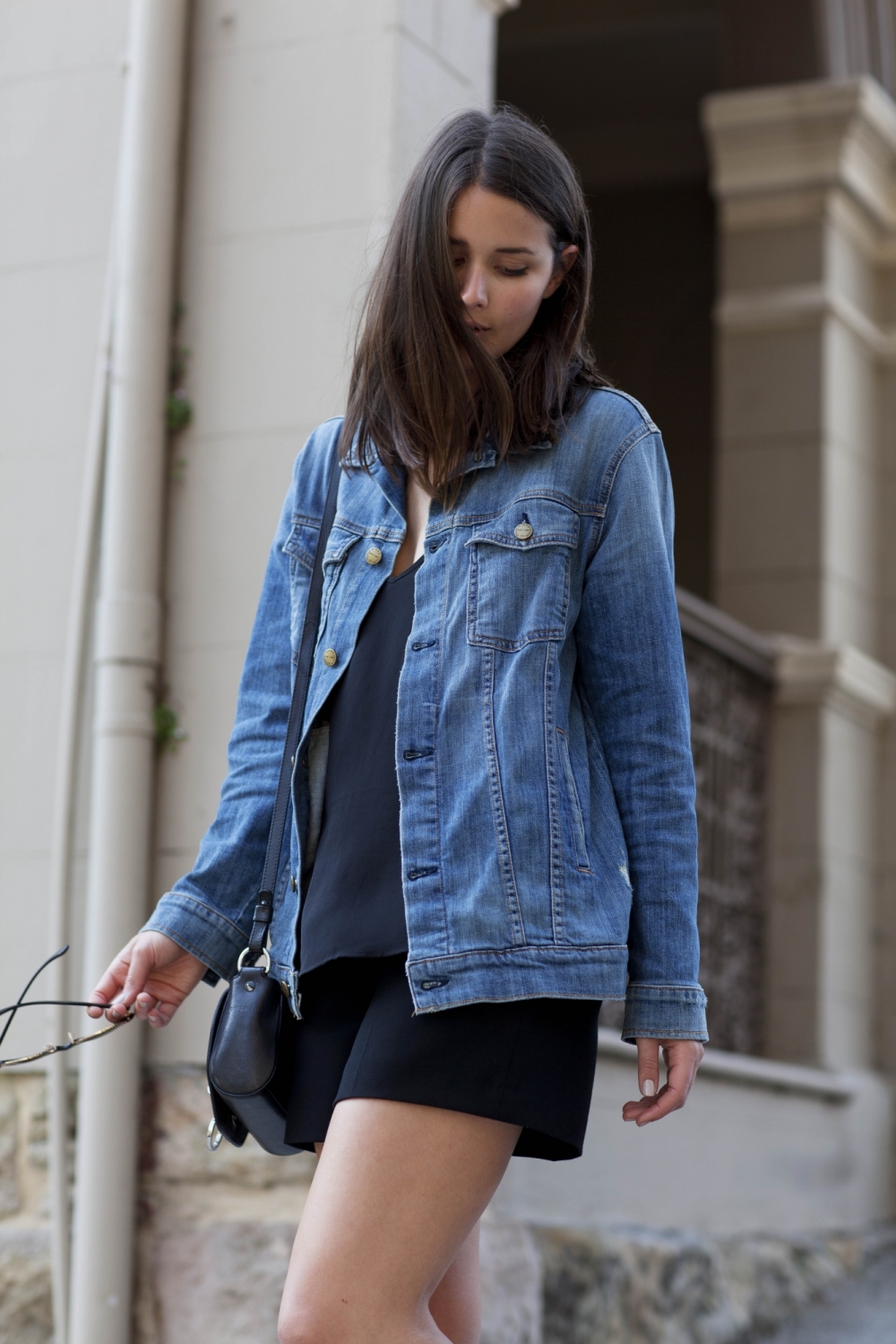 denim jacket with black shorts