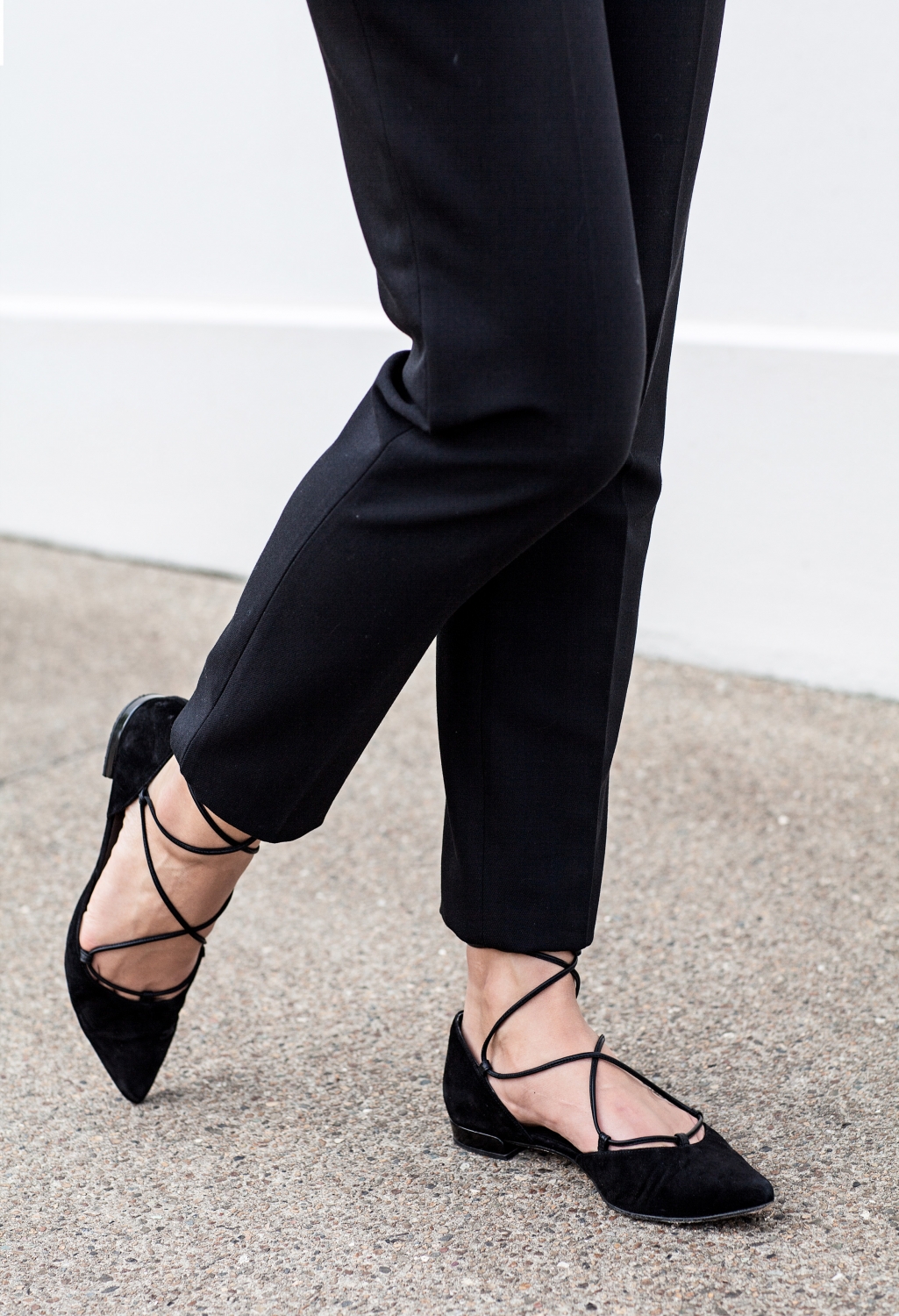 black pointed lace up flats