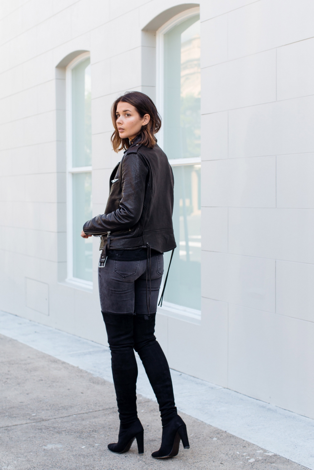 grey jeans with black boots