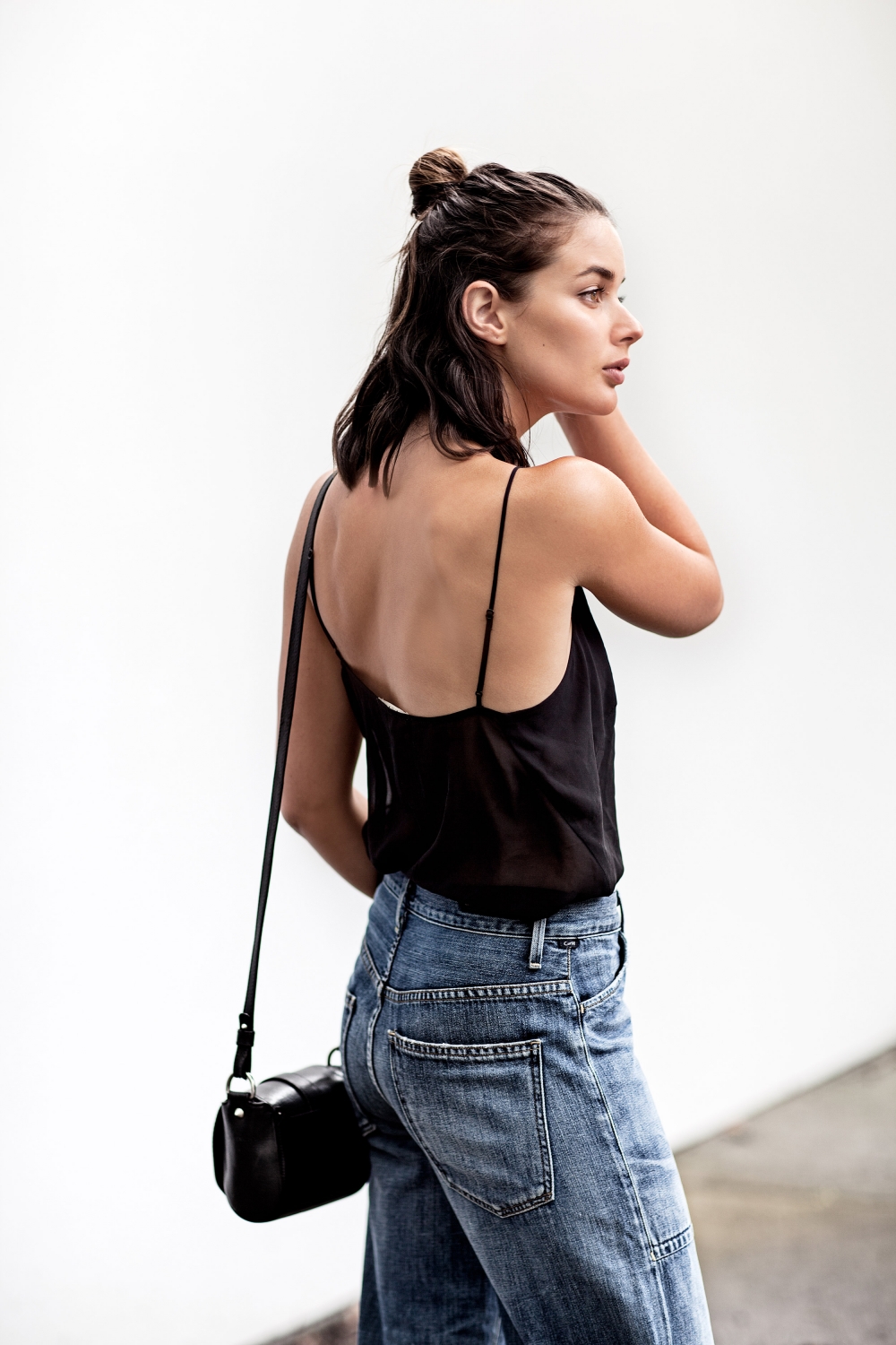 black cami and wide leg cropped jeans + street style + outfit