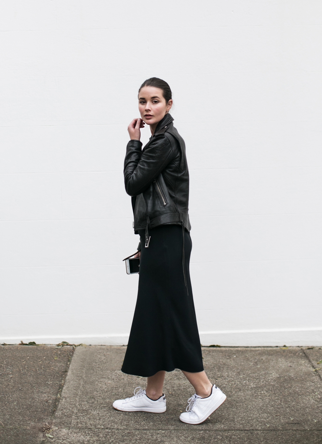 black dress and trainers