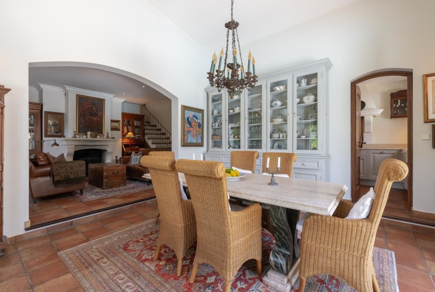 Dining room Tile Chandelier Fireplace