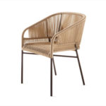 Varaschin's  CRICKET ARM CHAIR by ANKI GNEIB