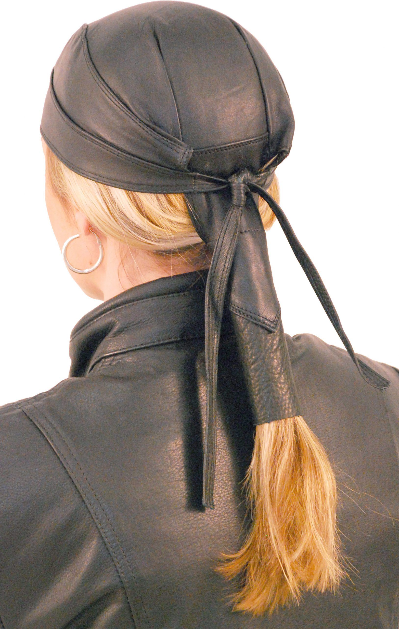 Leather skull cap with pony tail hair wrap.