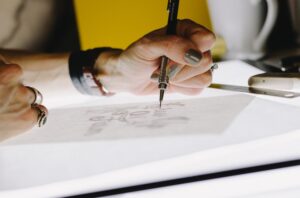 person drawing their trademark brand in Argentina