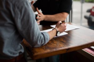 Two people in a business consultant's meeting