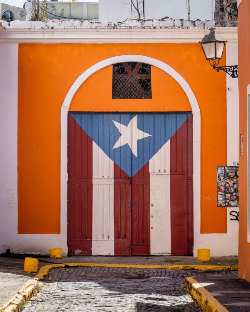 A doorway in San Juan is painted with the Puerto Rican flag. 