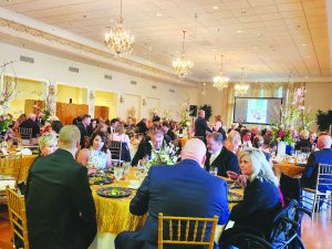 Gala attendees bid during the live auction.