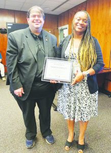 School Board Chairman Teddy Martin II is pictured with Tamei Easley, who was presented with the Kindness Ambassador Award.