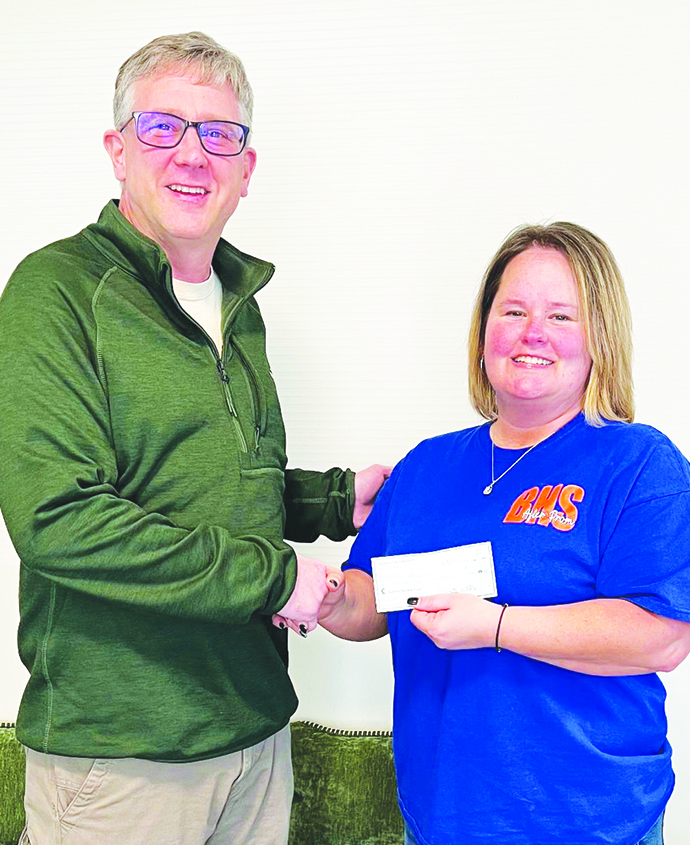 In February, the club gave a donation to the Bassett High School After Prom Committee. Pictured are Jim Franklin, representing the Kiwanis Club of Bassett and Shannon Janney, representing the BHS After Prom Committee. (Contributed)