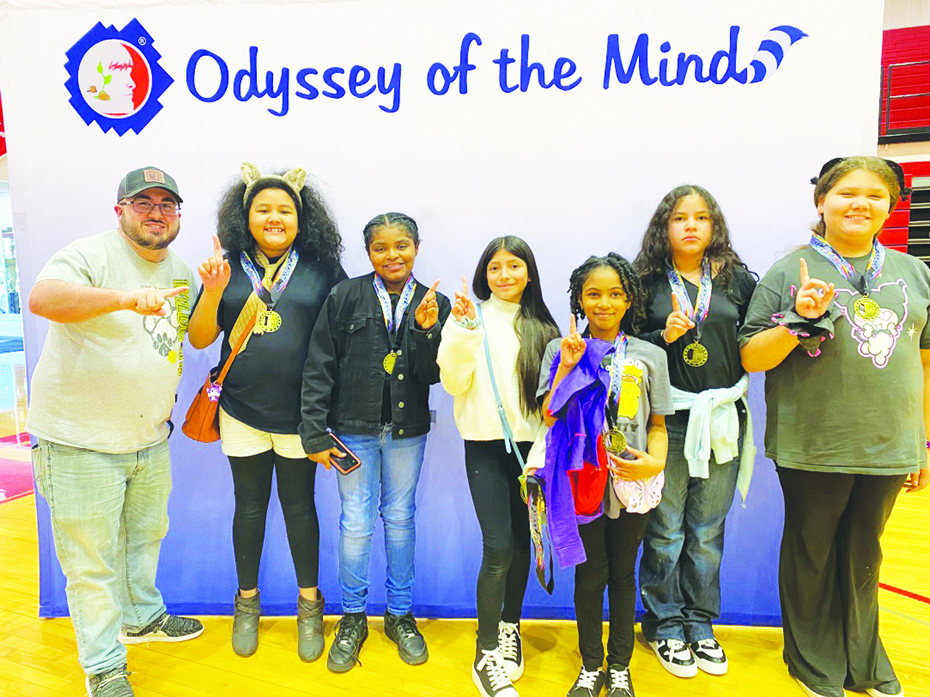 Albert Harris Elementary art teacher Wenn Harold (far left) coached students Sariyah Carter, Keiana Hairston, Yahya Rodriguez, Aria Lewis, Destiny Richmond, Jasmin Nolasco, Joselin Lara-Alvara to a first place win in their category at the regional Odyssey of the Mind competition.