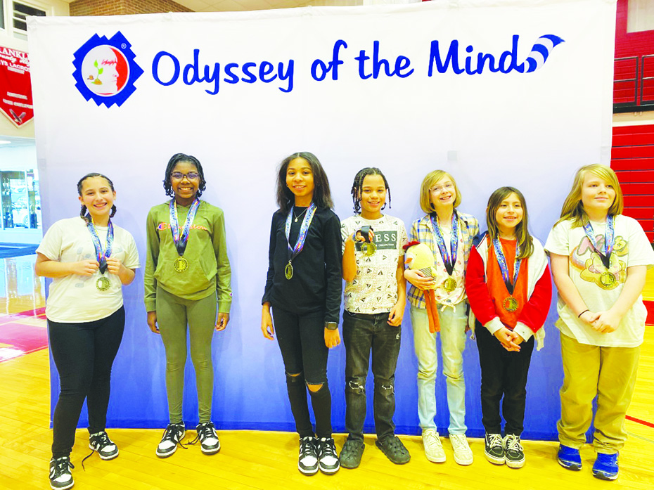 A team from Patrick Henry Elementary School earned a first place win for their problem, AI Tech-NO-Art. From left: Lilliana Torres, Keirsten Smith, Kennedy Martin, Bently Williamson, Margot Sharp, Elena Alvarez-Lozano, and Virgil Moore.