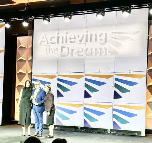 P&HCC president Dr. Greg Hodges receives the Leader College of Distinction award from Dr. Monica Parrish Trent (ATD Chief Program and Network Officer) and Dr. Karen A. Stout (ATD President and Chief Executive Officer) at Achieving the Dream’s annual DREAM conference in February.