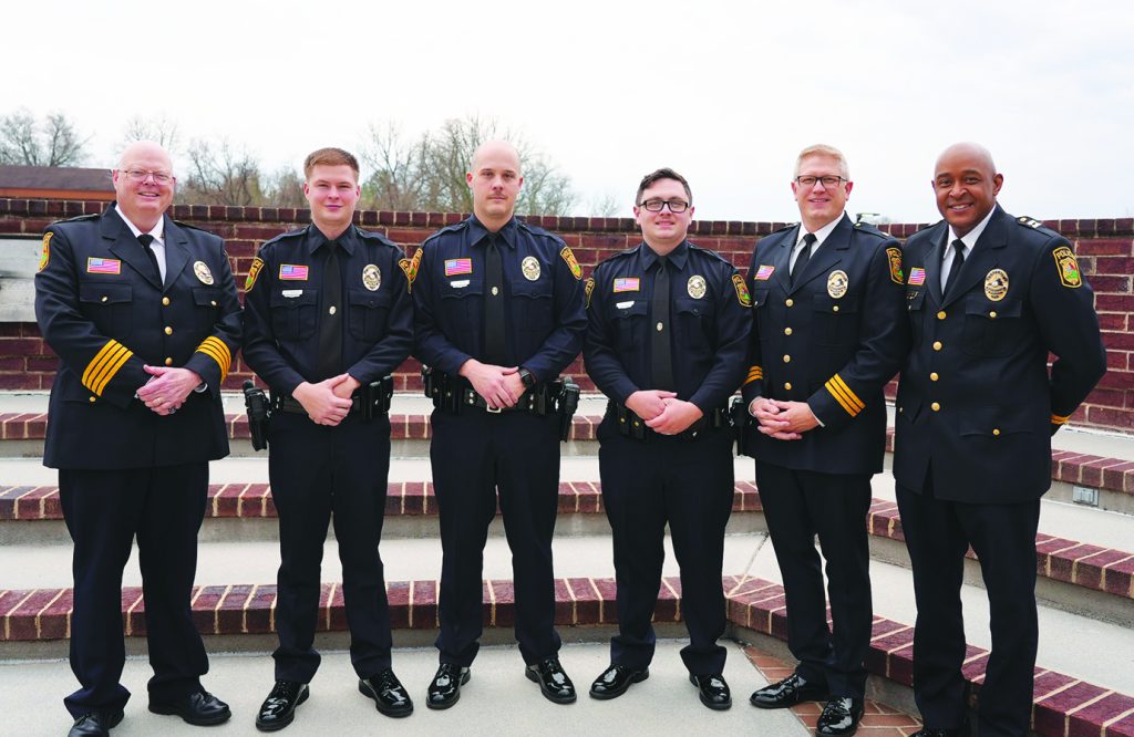 Martinsville Police Chief Rob Fincher is pictured with the three recent graduates - Andrew Horsley, Justin Havens, and Christopher Astin - along with Major C. H. Rhoads and Capt. Sandy Hines.