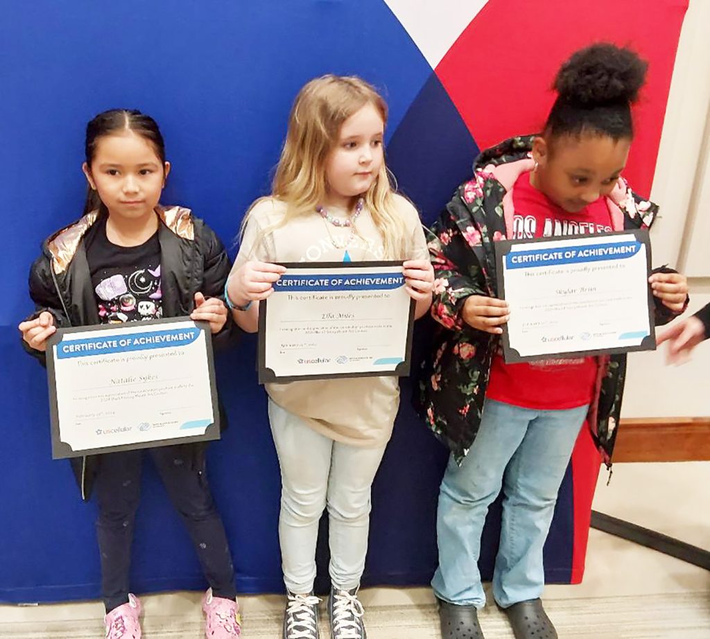 Natalie Sykes, Ella Miles, and Skylar Brim received a Certificate of Appreciation for participating in the art contest.