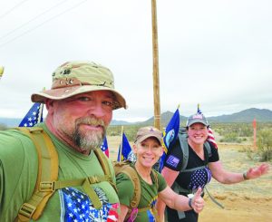 Patrick Rodgers, Careen Rodgers, and Katie Schneider at the Bataan Memorial Death March in New Mexico. 