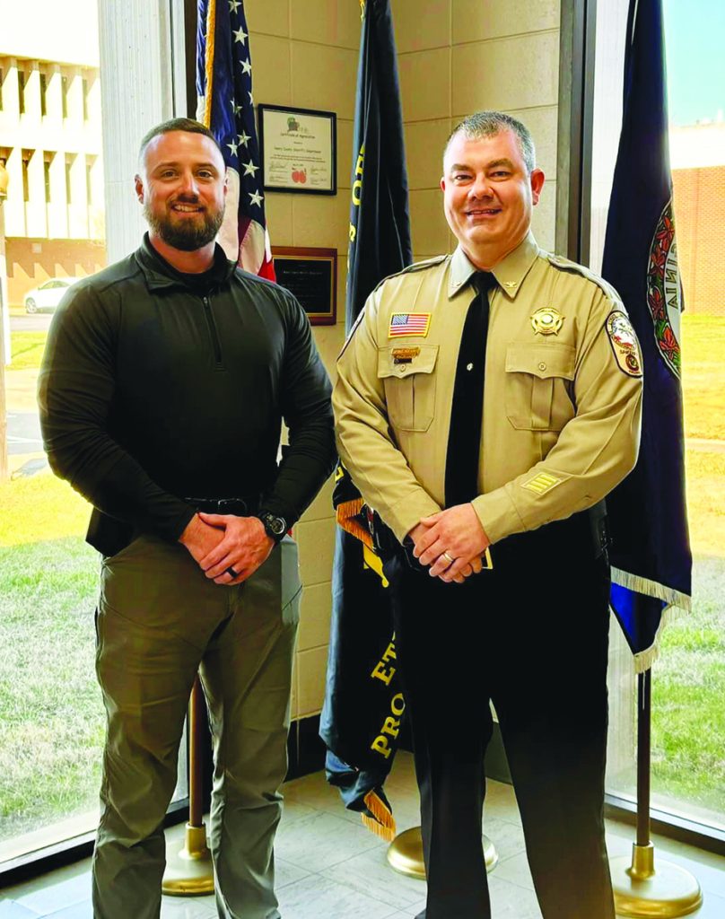 Robbie Wade is pictured with Henry County Sheriff Wayne Davis.