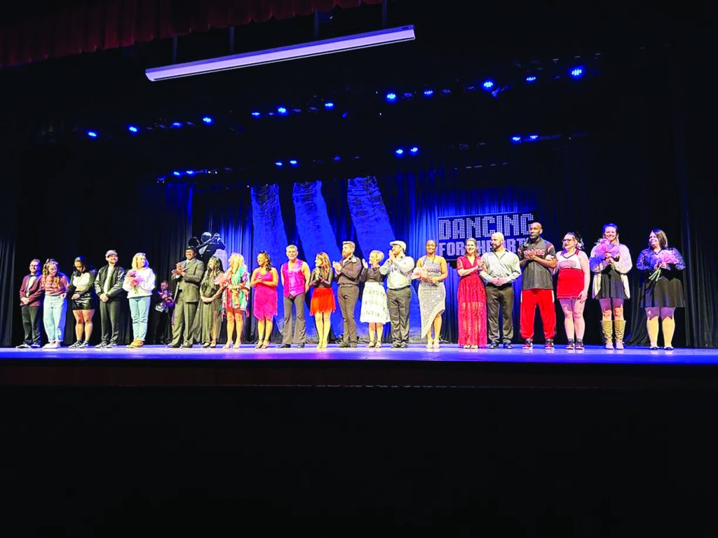 The full company of dancers and coaches onstage after the performance. Photo by Rick Dawson.