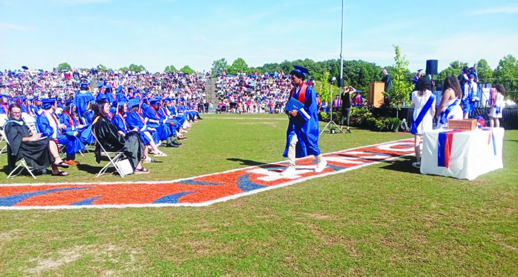 Students received their diplomas to the cheers of loved ones.