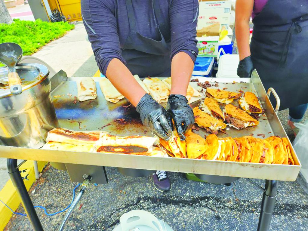 Asador El Verde prepared food at the Cinco De Mayo Festival held in Uptown Martinsville.