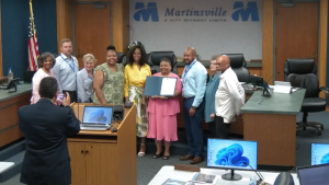 Alpha Kappa Alpha Sorority Inc. members pose with Martinsville City Council members.