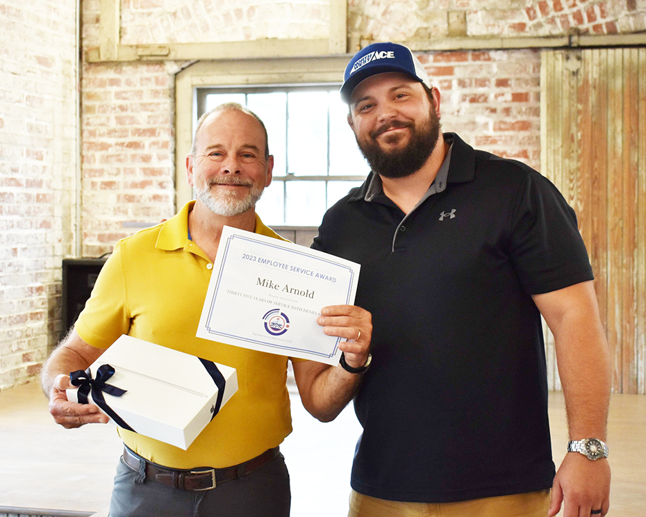 Mike Arnold (left) was recognized for his 35 years of service. He is pictured with Dustin Christian, director of Maintenance.