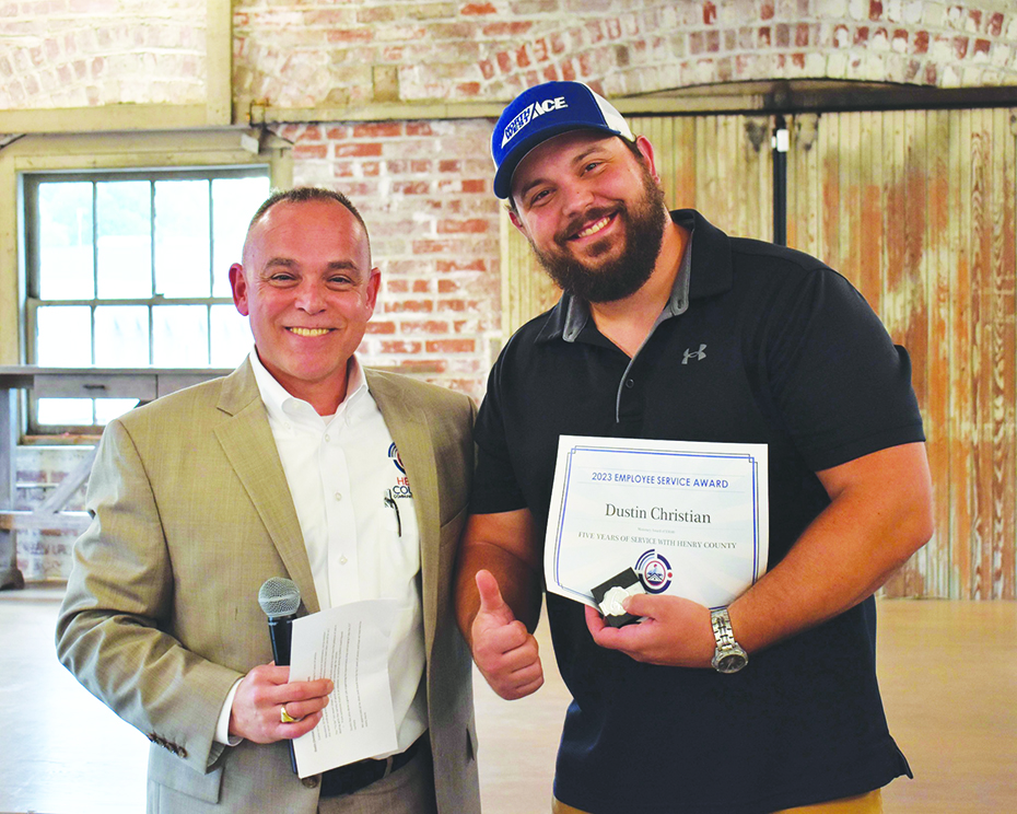 Dustin Christian (right) was recognized for his 5 years of service. He is pictured with Assistant County Administrator J.R. Powell.