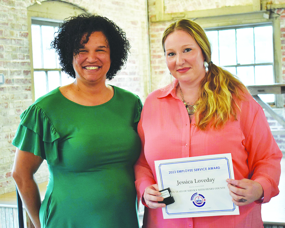 Jessica Loveday (right) was recognized for 5 years of service. She is pictured with Tierra Dillard, director of the Martinsville-Henry County 911 Center.