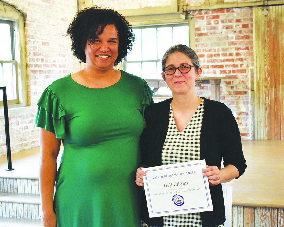 Hali Clifton was recognized for 5 years of service. She is pictured with Tierra Dillard (left), director of the Martinsville-Henry County 911 Center.