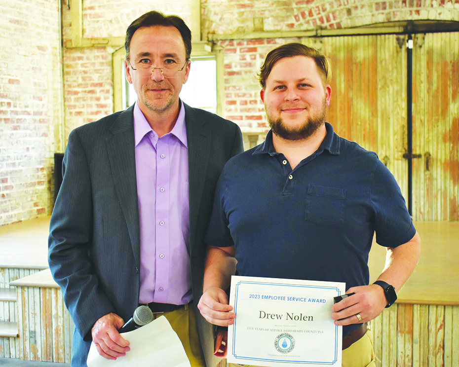 Drew Nolen was recognized for 5 years of service. He is pictured with Mark Alley, director of Information Services.