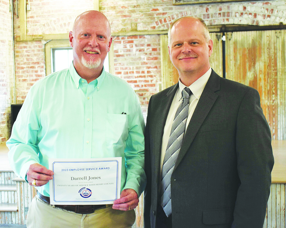 Darrell Jones is pictured with County Administrator Dale Wagoner. Jones, the county’s Chief Financial Officer, was recognized for 20 years of service.