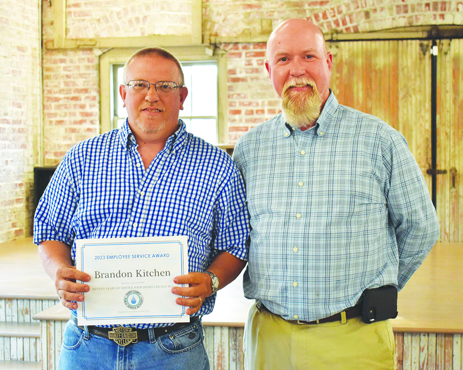 Brandon Kitchen (left) was recognized for 15 years of service. He is pictured with Steve Clary, director of PSA Construction & Maintenance.