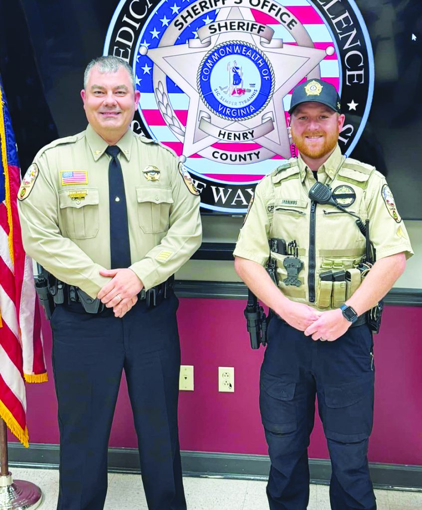 Marinus works in the Patrol Division, and is pictured with Davis.