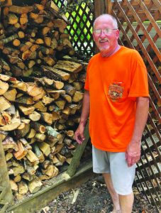 Jimmy Mullins, owner of Salthouse Store & More, will help you load firewood - but if the store’s closed, folks are welcome to get what they need and just pay later.