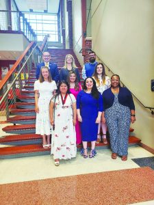 Some graduates of the Longwood@NCI program pose for photos before the Completion Ceremony.