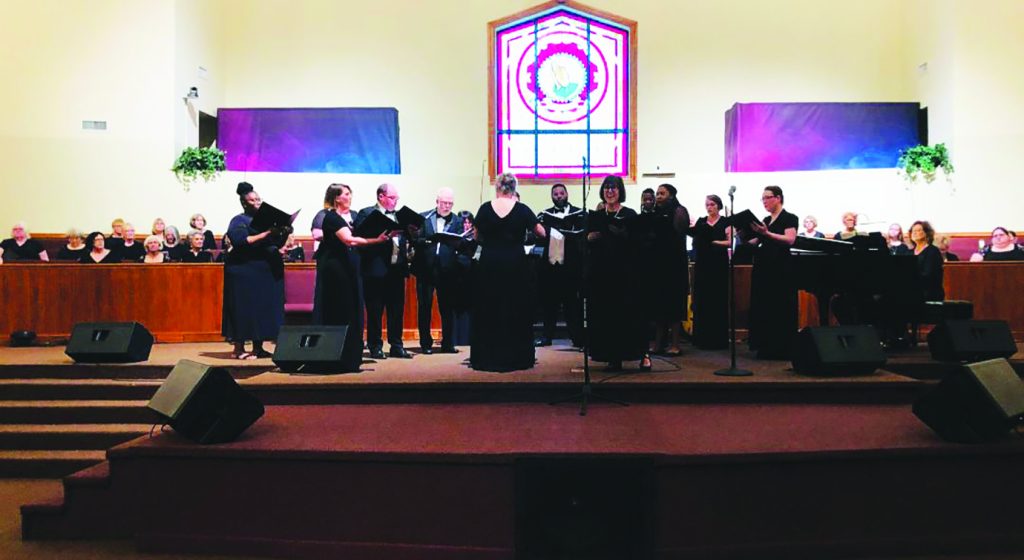 The Smith River Singers performed Monday for an audience of several hundred at Galilean House of Worship. Pictured here, Kim Snyder, backed by the Still Water Ensemble, sings “Can You Feel the Love Tonight.” Pam Randall is directing, and Beth Chapman accompanies on piano. Smith River Singers are all volunteers, and membership is open. Sixty-five singers performed in this concert, “Love Is in the Air.”