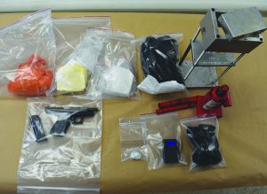 Authorities seized what is believed to be illegal drugs with an estimated street value of more than $100,000.