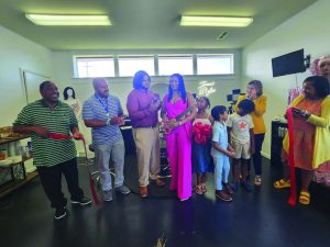 The ribbon cutting for Imani Styles took place in Imani Hairston’s personal booth.