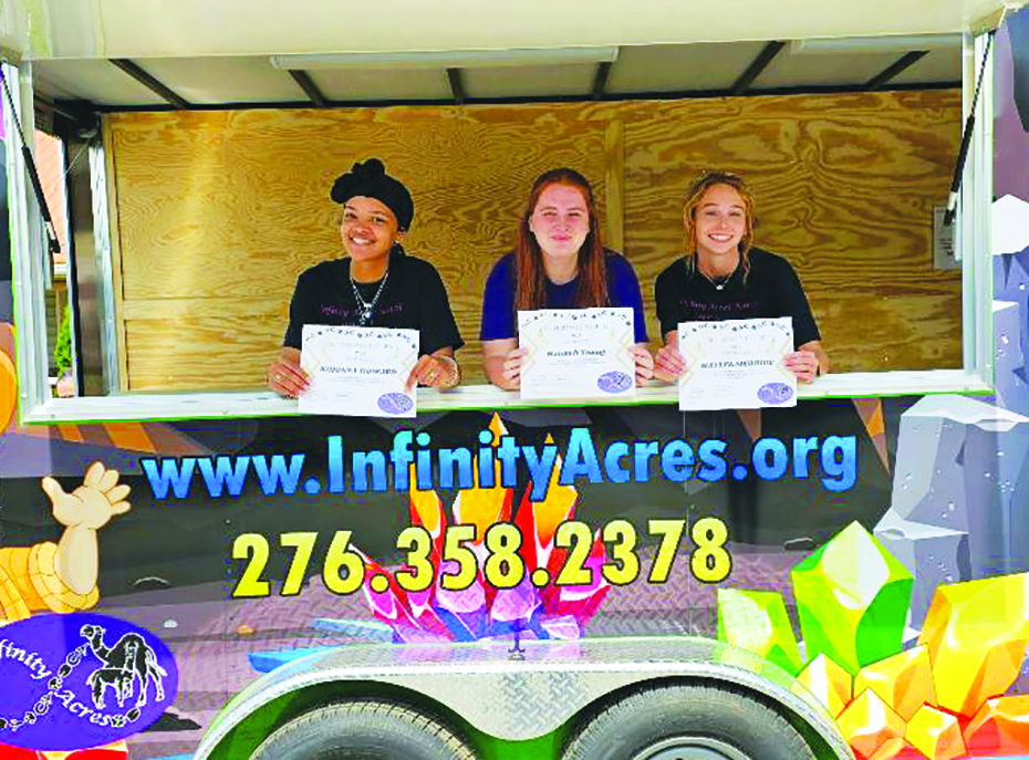 Three United Way Interns are helping out at the Infinity Acre Ranch. (Contributed)