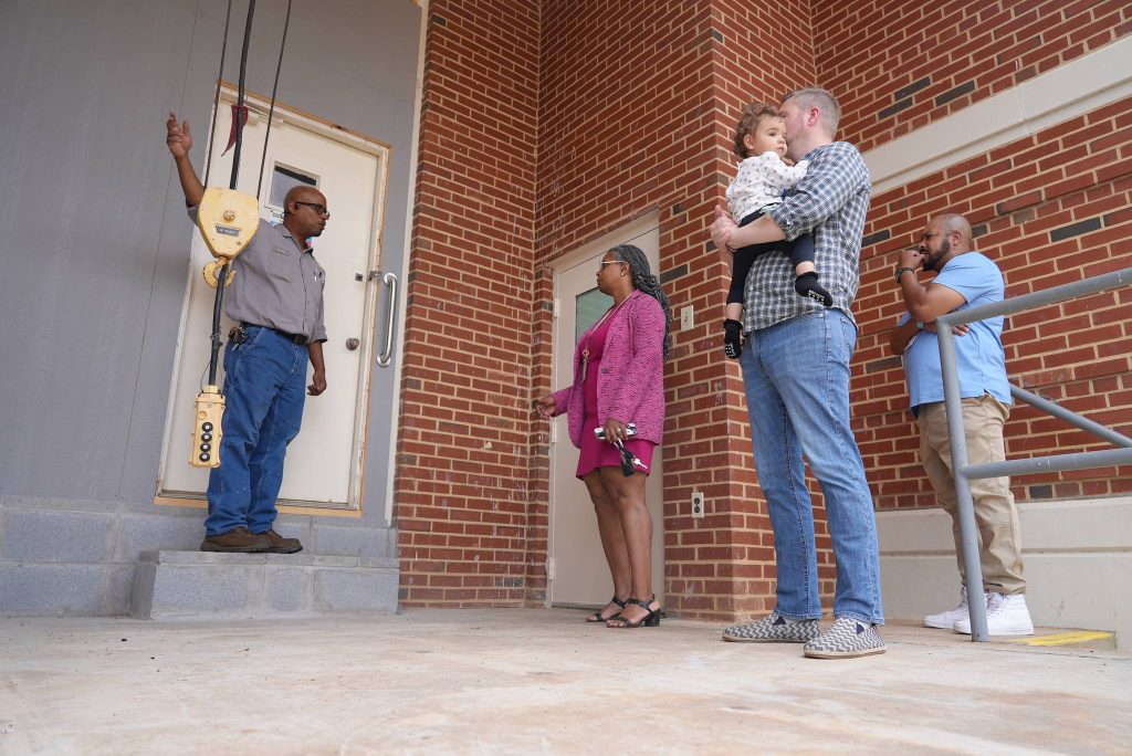 Randy Millner, Water Plant Maintenance Technician; City Manager Aretha Ferrell-Benavides; Vice Mayor Aaron Rawls and daughter, and Mayor LC Jones.