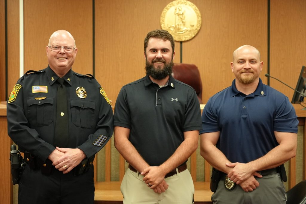 Chief Rob Fincher (left) is pictured with new detectives Tucker Brown and Adam Parnell.