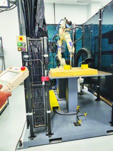 Students practice robotic welding at the MET Complex.