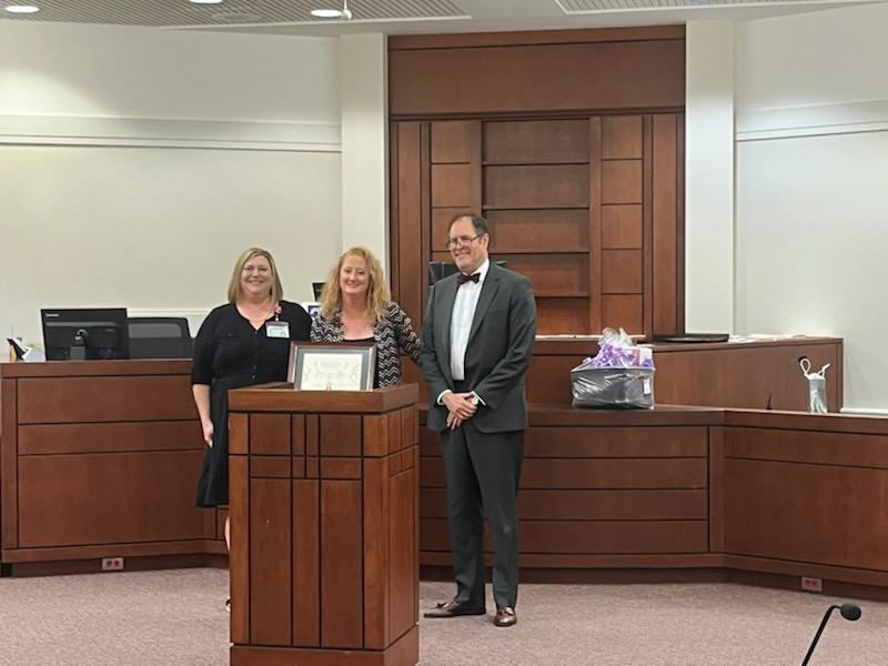 From left, Leanne Martin, Jamie Elgin, and Circuit Court Chief and Presiding Judge G. Carter Greer at Elgin’s Adult Recovery Court graduation.