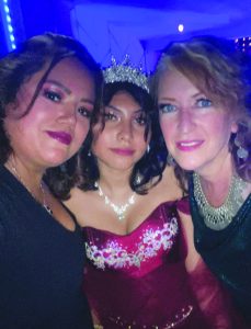 Cousin Estela, birthday girl Solash and the author, all adorned in fake eyelashes, smile for the camera.