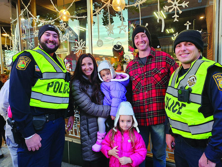 Parade goers bundled up for the crisp air to enjoy the festivities.