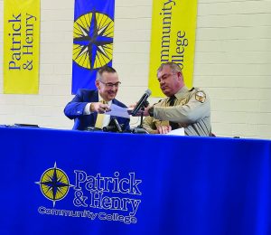 P&HCC President Greg Hodges and Henry County Sheriff Wayne Davis inked an agreement last week to provide trade education to inmates housed in the Henry County Adult Detention Center.