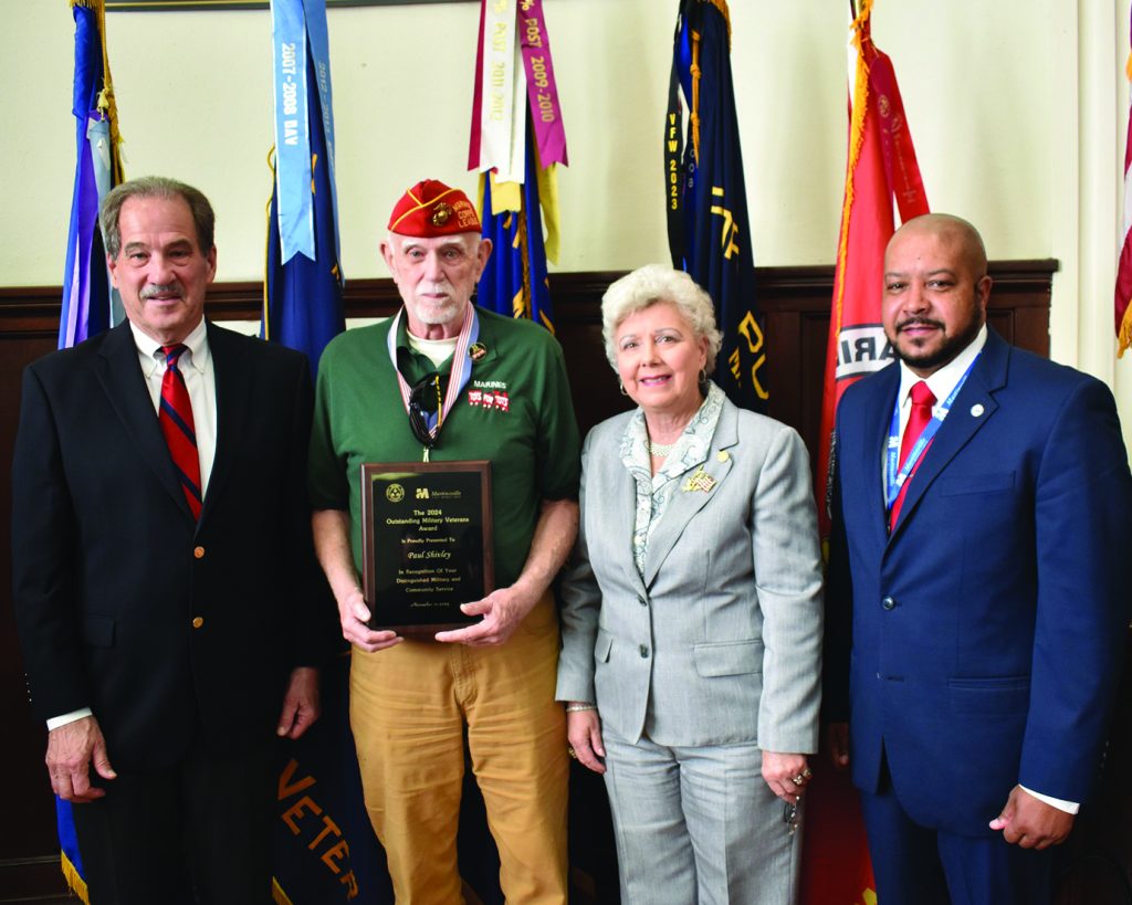 Paul Shivley (second from left) is pictured with Jim Adams (left) and Debra Buchanan (center right), both of the Henry County Board of Supervisors, and Martinsville Mayor LC Jones (far right). Shivley was recognized as the 2024 Outstanding Military Veteran for Henry County and the City of Martinsville.