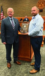County Administrator Dale Wagoner (left) presented a plaque to supervisor Travis Pruitt, of the Ridgeway District, for being a member of the VACO Supervisors’ Program Class of 2024.