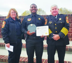 Martinsville Sheriff Steve Draper (right) was among the members of the Martinsville Sheriff’s Office to welcome Deputy DaiZhawn Giggetts (center). Giggetts recently completed training at the Piedmont Regional Criminal Justice Training Academy.