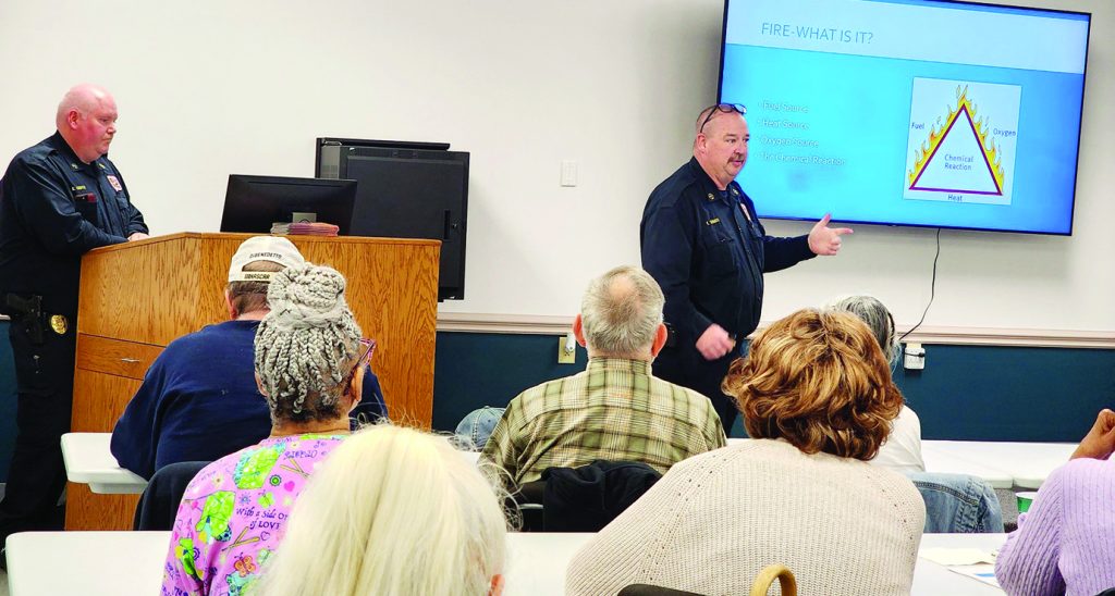 Attendees learn about fires and fire protection.